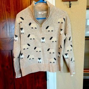 Loft size medium sheep print sweater. This is new without tags